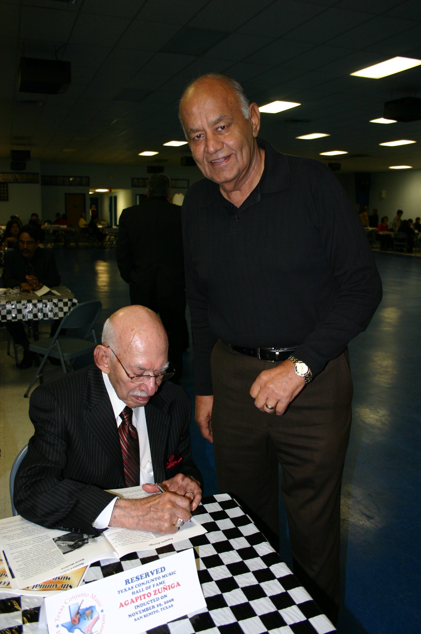 Agapito signing autographs
