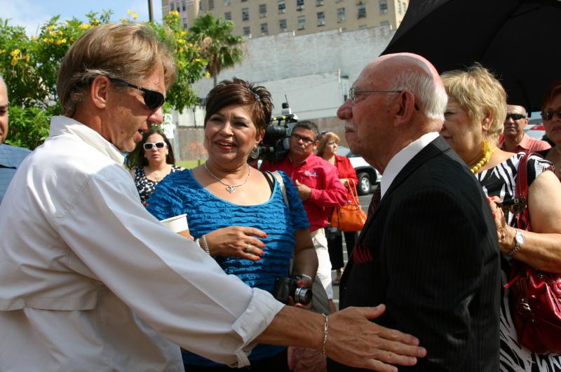 A congratulatory handshake from Brad Lomax